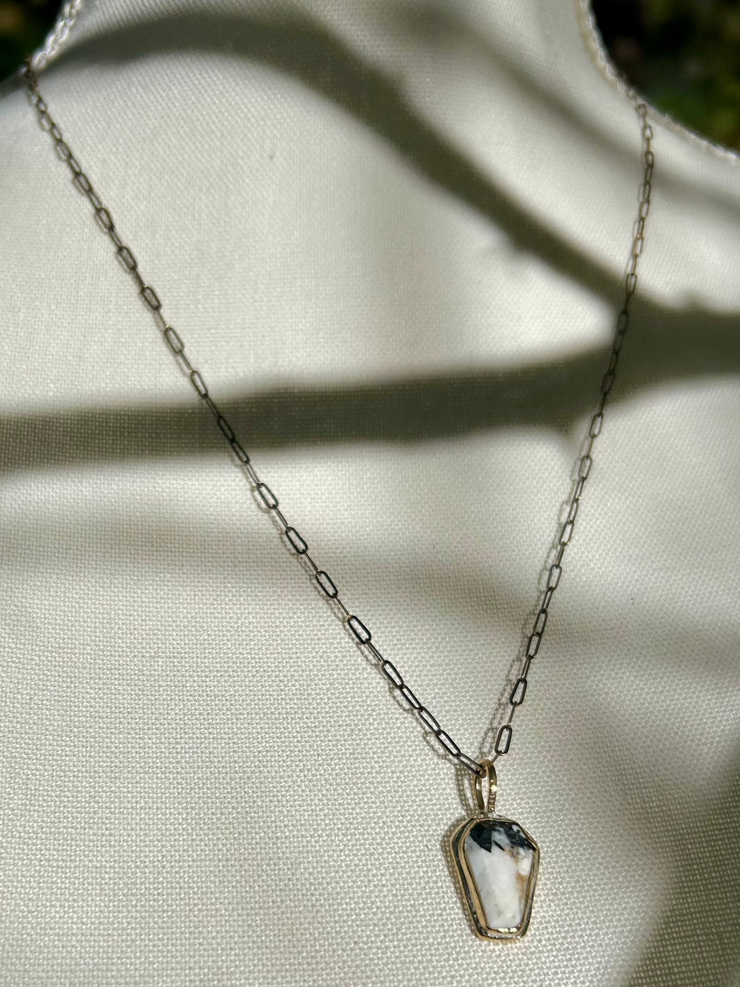 BRASS COFFIN PENDANT